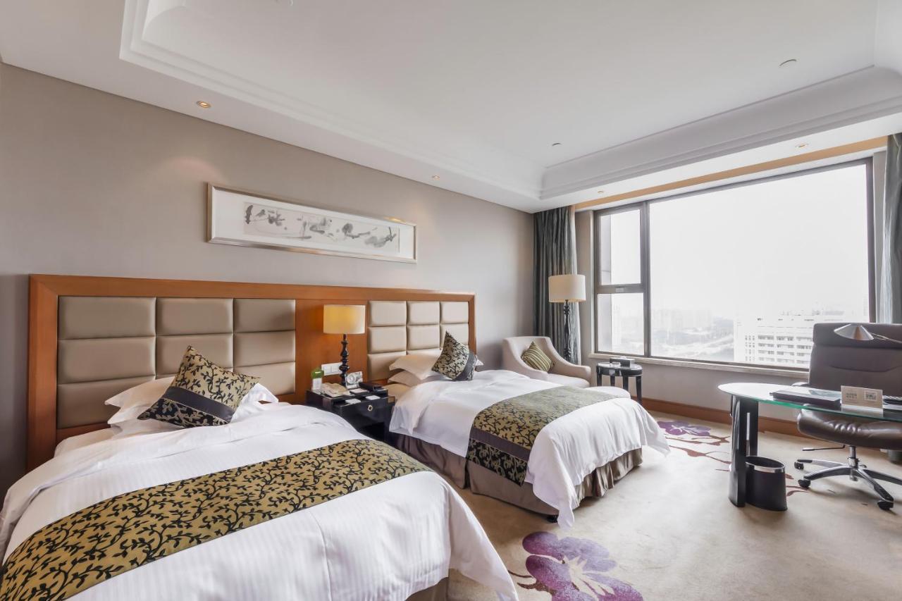 Wyndham Xinyang Downtown Hotel Exterior photo
